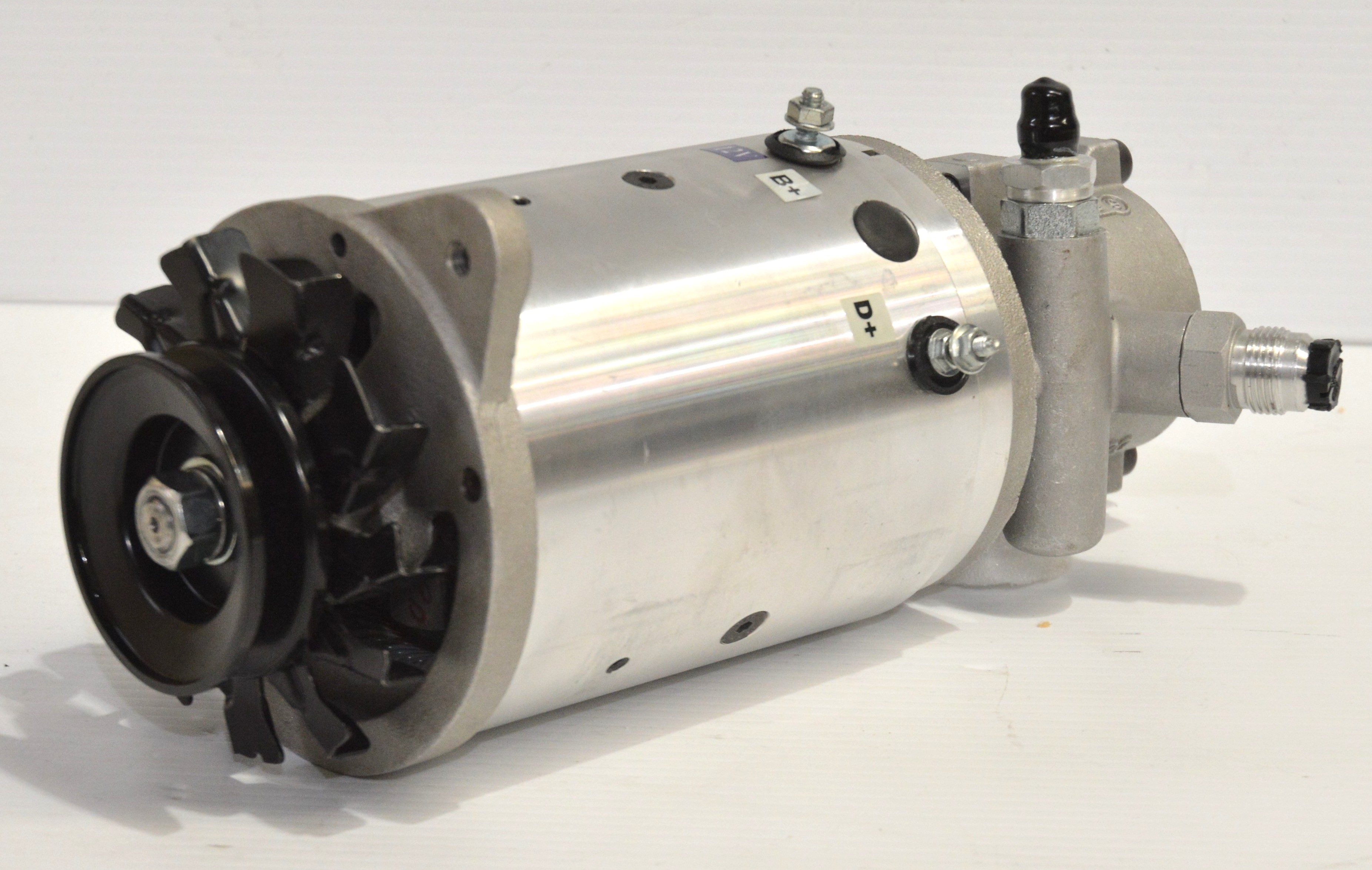Dynogen Chev 90amps & supplied with power steering pump fitted on back. This unit replaces original generator and power steering pump set up on 1955-64 Chevs and is 50% lighter than original unit