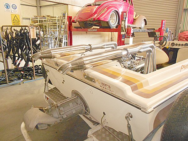 This custom header and muffler system by CASTLE HEADERS was built for a high performance Ford Cleveland 351.