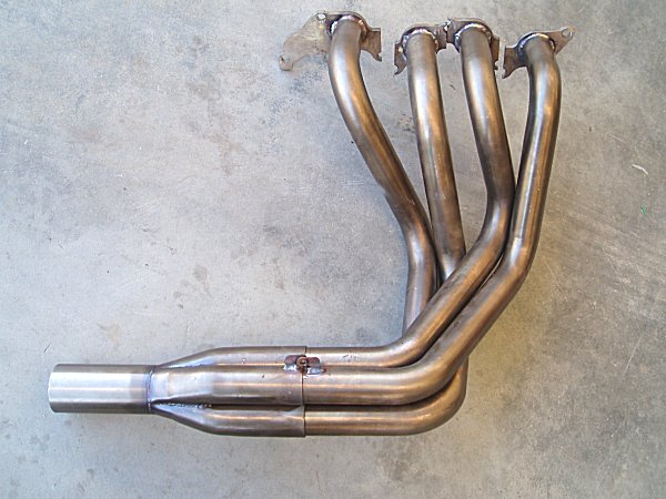 Custom made 4 into 1 stainless steel headers with a Castle Headers merge Collector